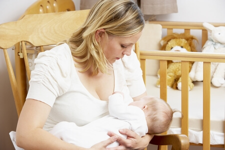 Breast feeding to child