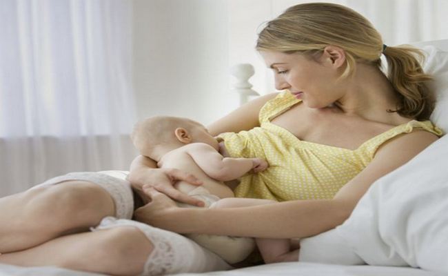 Breast feeding to child